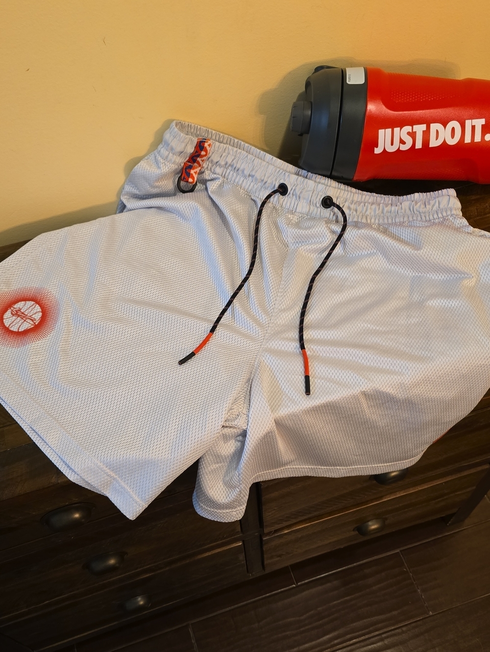Men Nike Light Grey Mesh Athletic Shorts with Red Accents